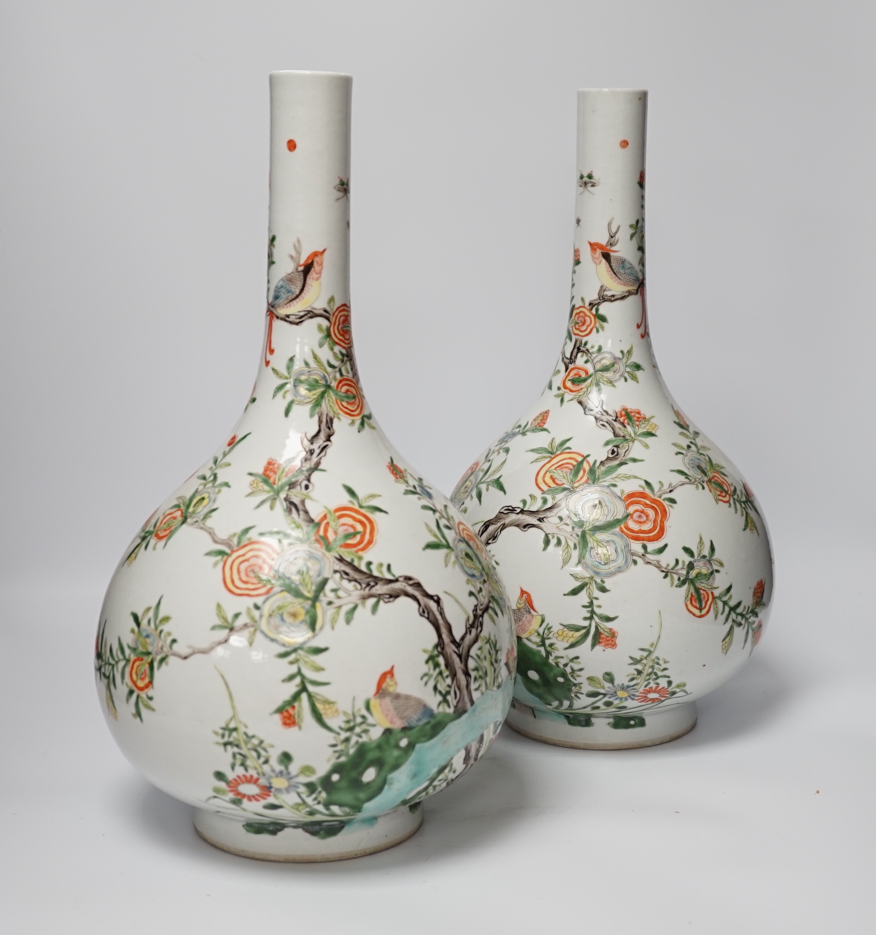 A pair of modern Chinese Kangxi style famille verte bottle vases, 40cm high